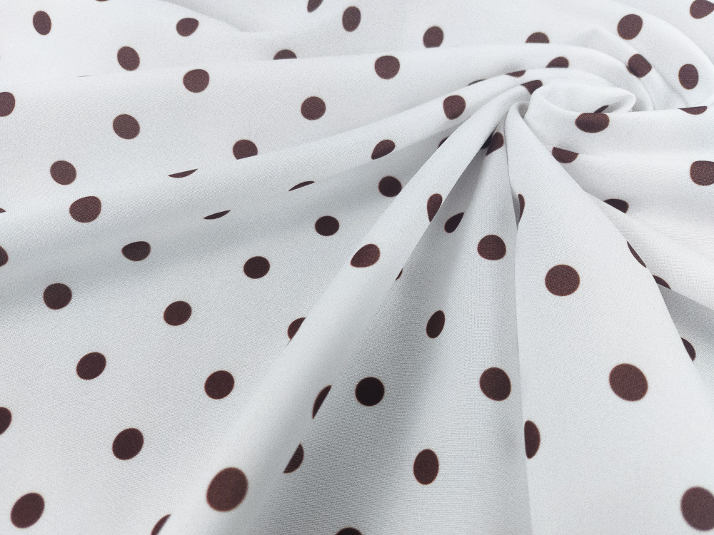 Strech fondo blanco lunar chocolate