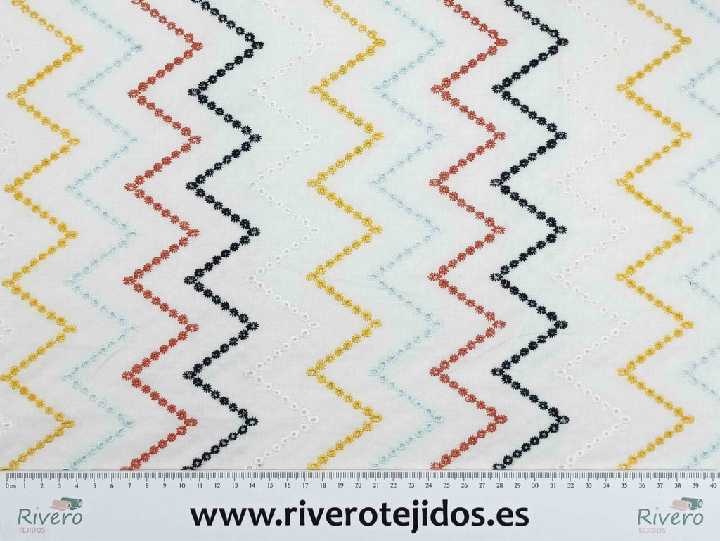 Batista blanca con líneas zigzag de colores