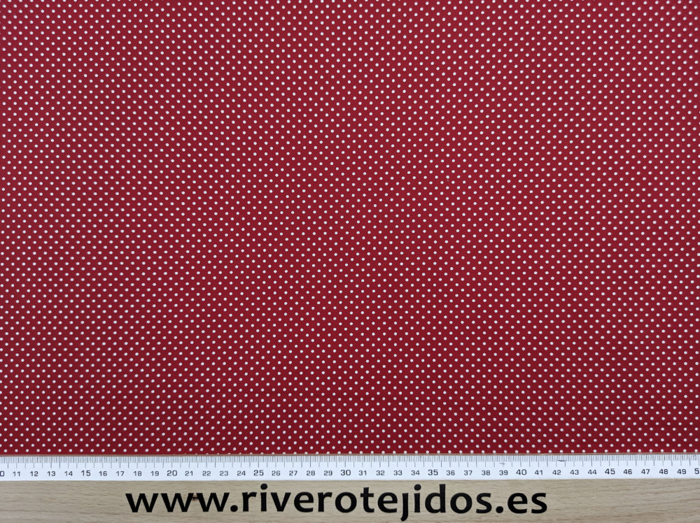 Algodón 100%, fondo rojo con topos blancos