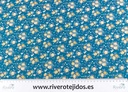 Algodón 100% fondo azulón flor mostaza
