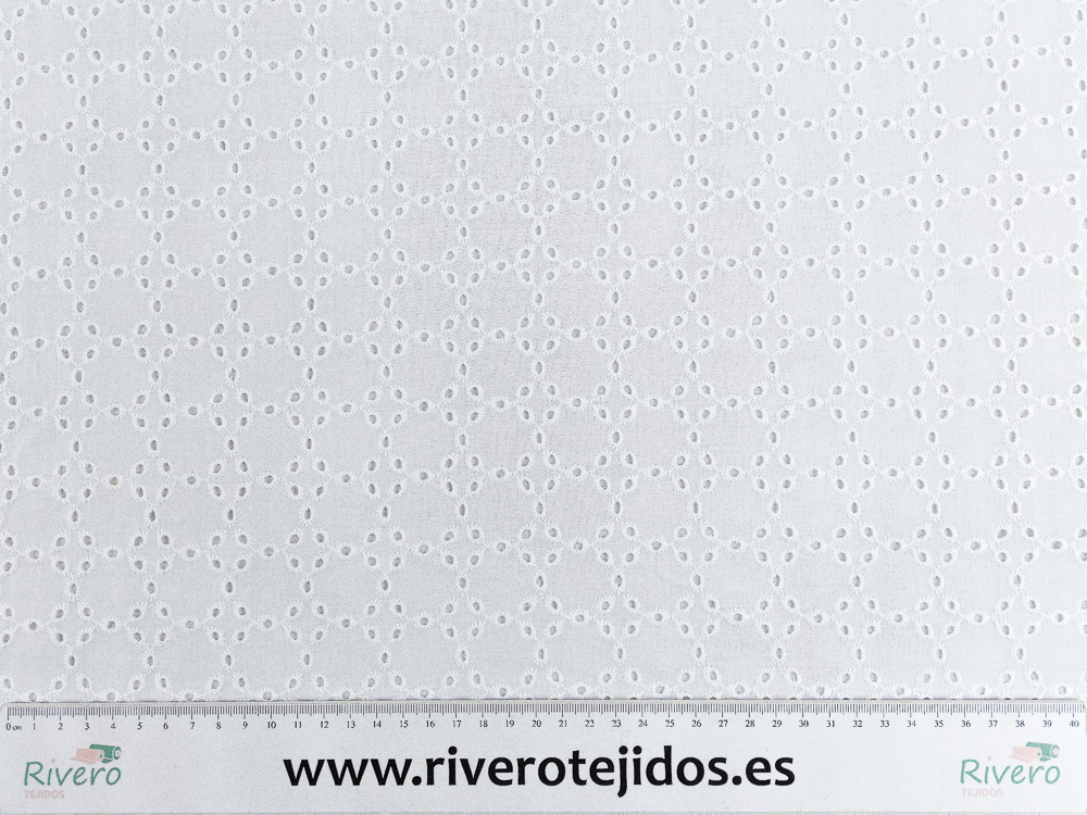 Perforado blanco dibujo formando círculos